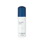 Skincare foam cleanser bottle with blue cap on a white background